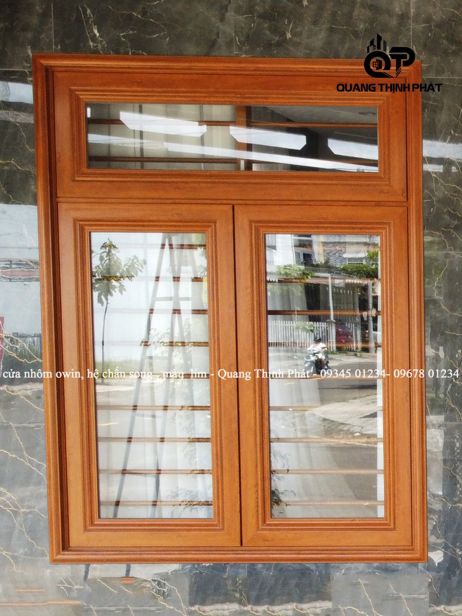 Cửa nhôm Owin hệ chấn song, màu vân gỗ lim - Quang Thịnh Phát