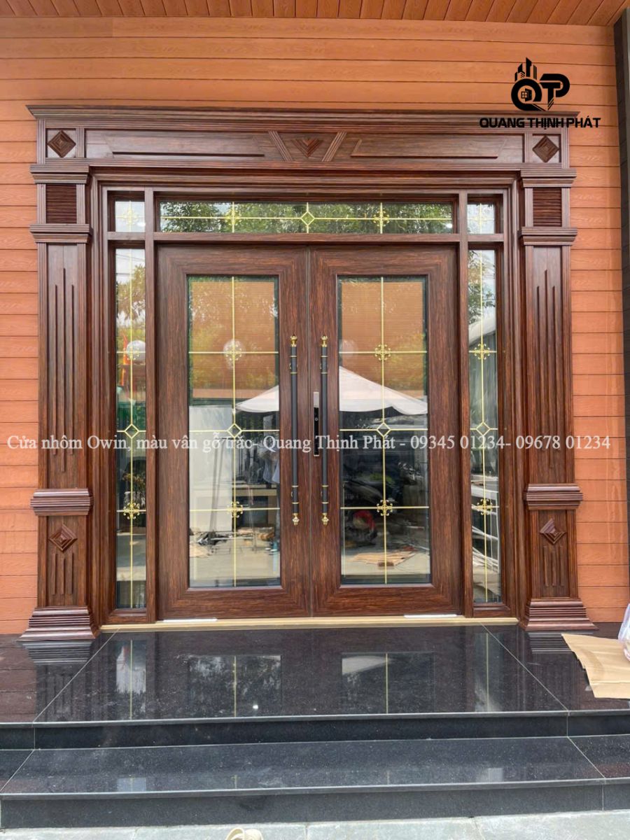 Cửa thủy lực Owin, màu vân gỗ trắc, có phào đại - Quang Thịnh Phát